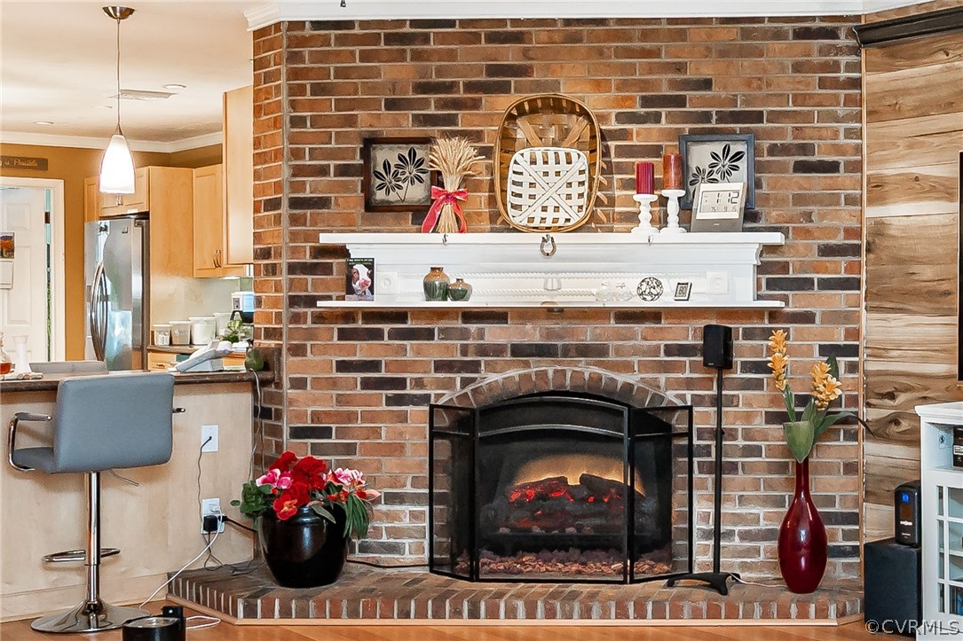 Wood burning brick fireplace with electric insert