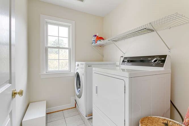 Laundry room with raised area for washer and dryer (washer and dryer do not convey)