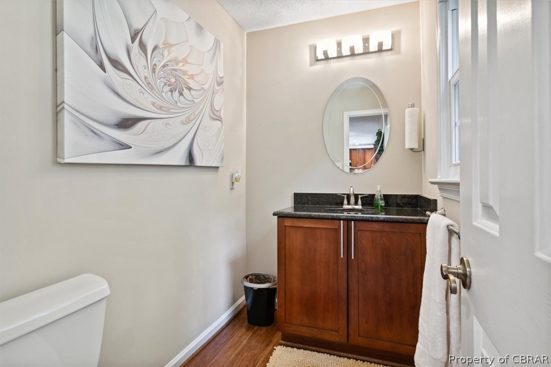 A renovated 1/2 bath just off the den allows guests to have easy access.