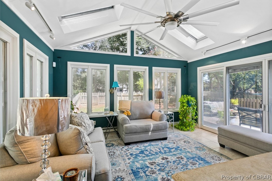 Windows, beautiful skylights and a large upgraded ceiling fan are added touches.