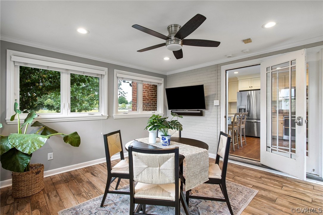 The Florida Room has a mini-split AC unit and has been remolded to include Heating/Cooling, Recessed Lights, Tile Flooring, Ceiling Fan and a Door to the Backyard area.
