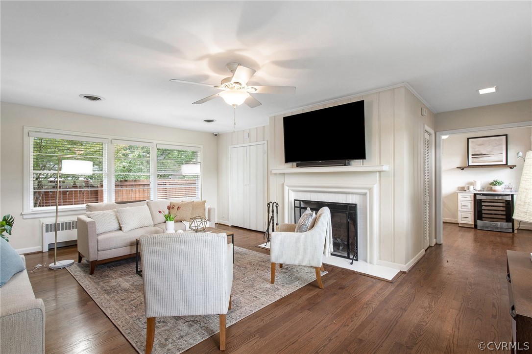 The Family Room includes a completely redone Wood-Burning Fireplace; a $12,000 renovation. The whole house includes renovated Sand-and-Stain Hardwood Floors!