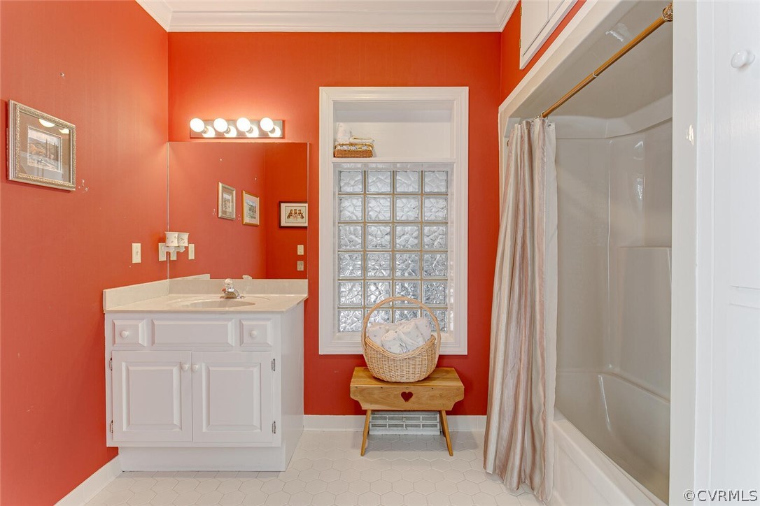 En-suite Bathroom for Bedroom #4 with single vanity, tub/shower, toilet, ceramic tile floor, 2 storage closets, upper storage.