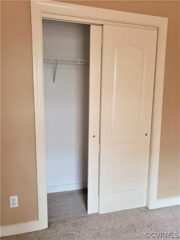 Bedroom 2 with a slider door closet