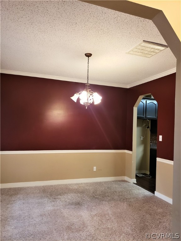 Chair railing and arched doorways. Updated light fixture.