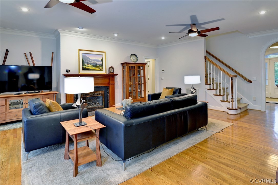 The family room features hardwood flooring and a gas fireplace.