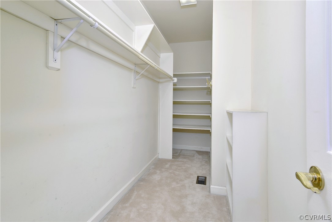 The first-floor laundry room features a utility sink and shoe/backpack storage area.