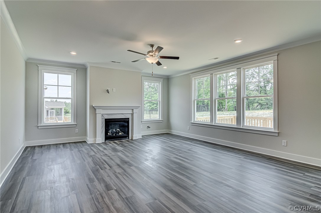 Photo represents the plan, not the actual home. Design selections may vary. Continuing into the main living area you’ll find the spacious family room w/ gas fireplace and recessed lighting.