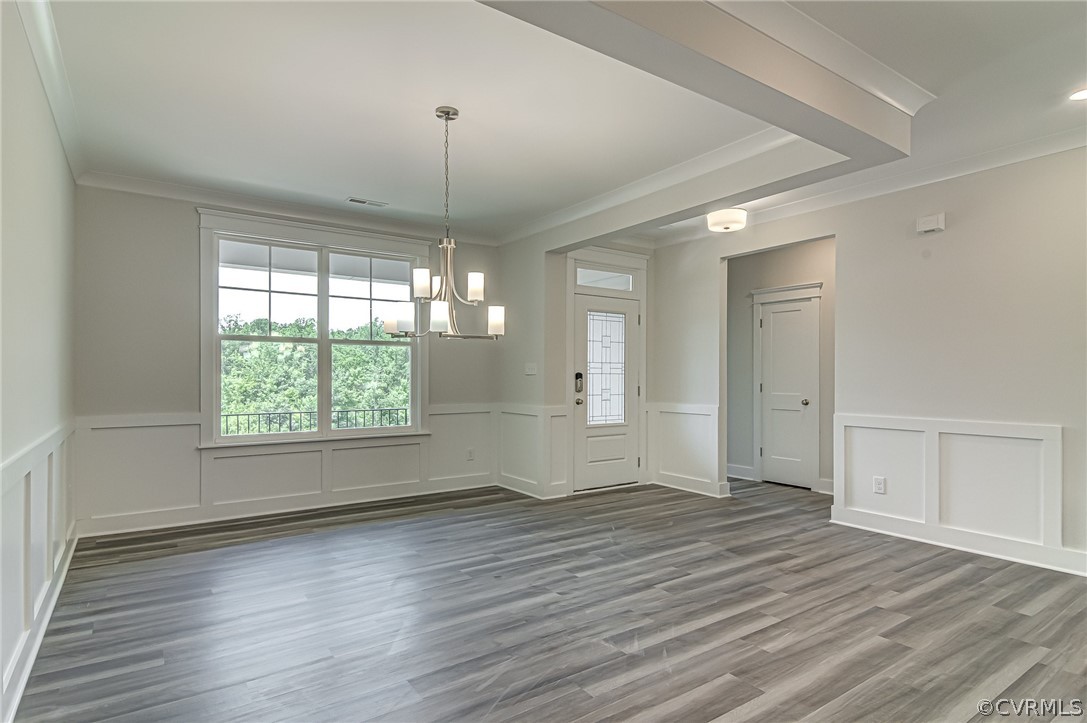 Photo represents the plan, not the actual home. Design selections may vary. As you step inside you’ll be greeted by the formal dining room directly off of the foyer.
