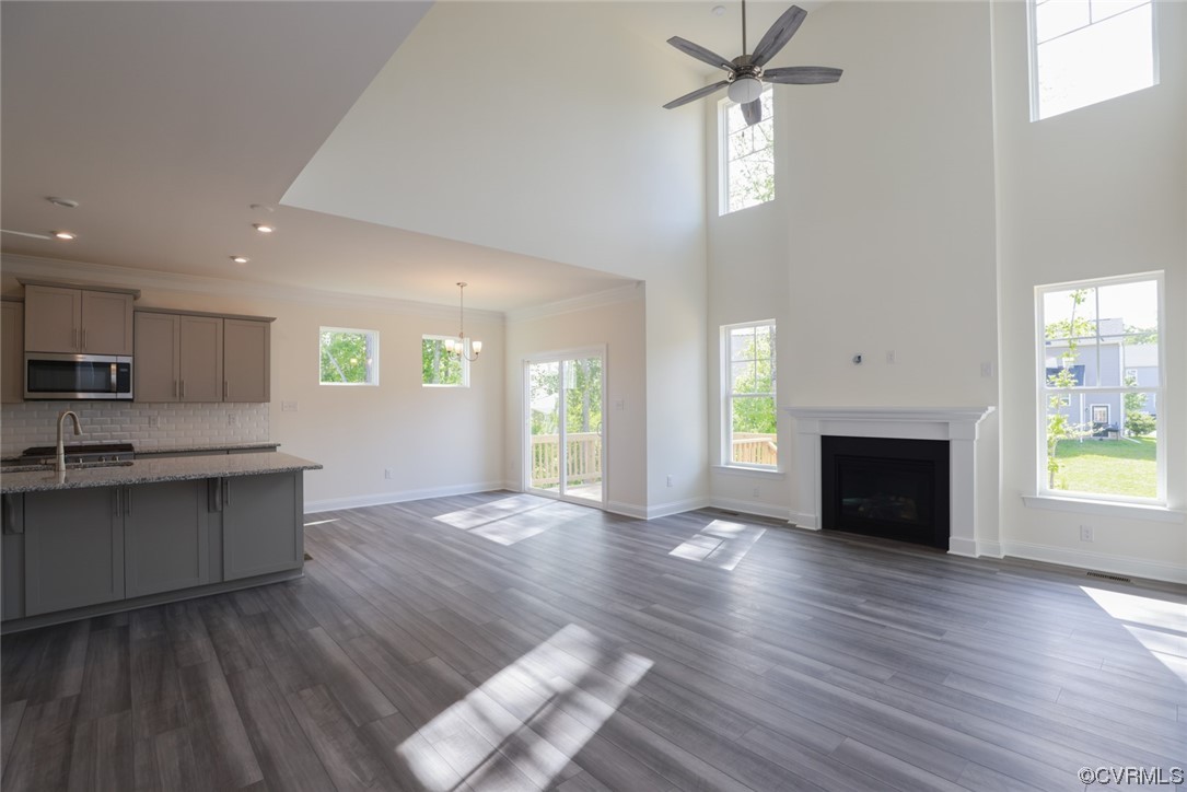 Photo represents the plan, not the actual home. Design selections may vary. You’ll love this open concept home as you continue into the main living area. Enjoy entertaining guests in the family room w/ gas FP or breakfast area, open to the kitchen. 
