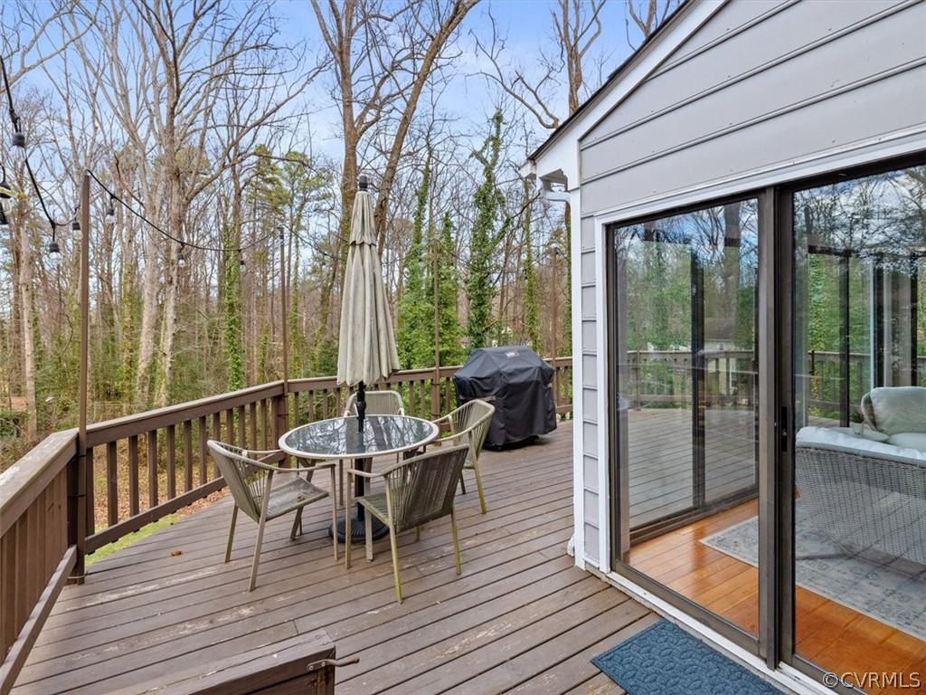 Large rear wrap around deck with excellent views of the back yard.