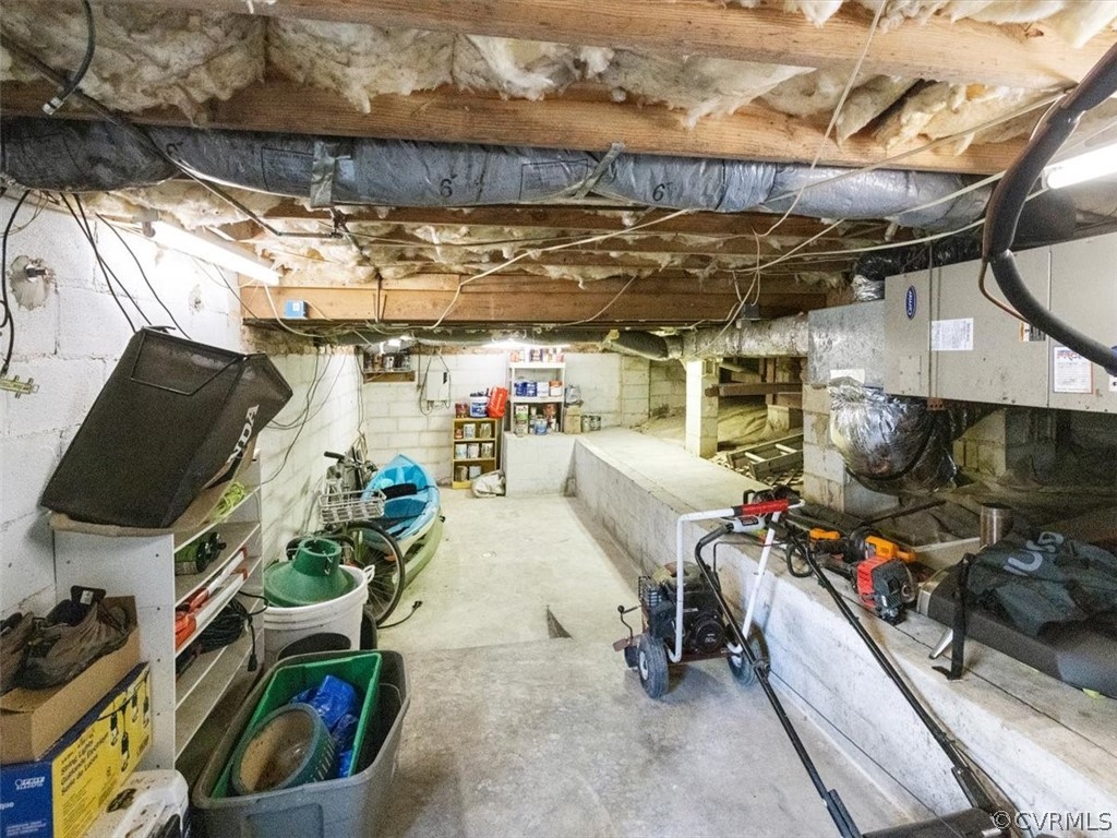 Walk in basement/crawl space has tons of storage space & room for a small workshop like area.