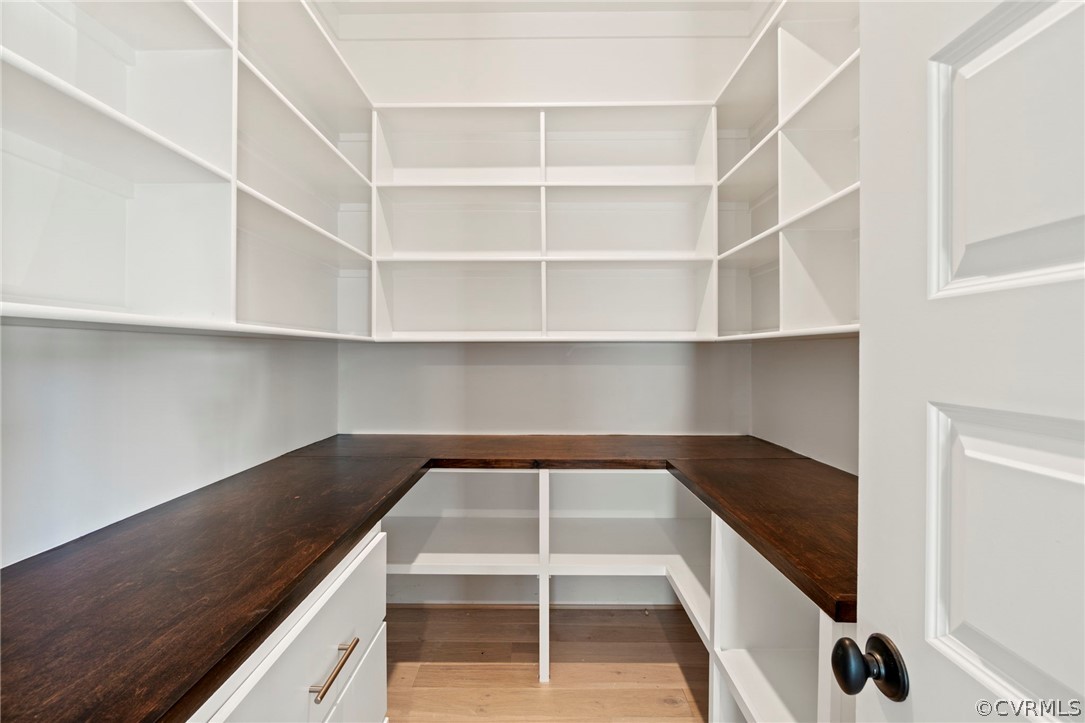 Walk-in Pantry area. *Photos of Previous Model Home. Optional Features and Finishes may be demonstrated.*