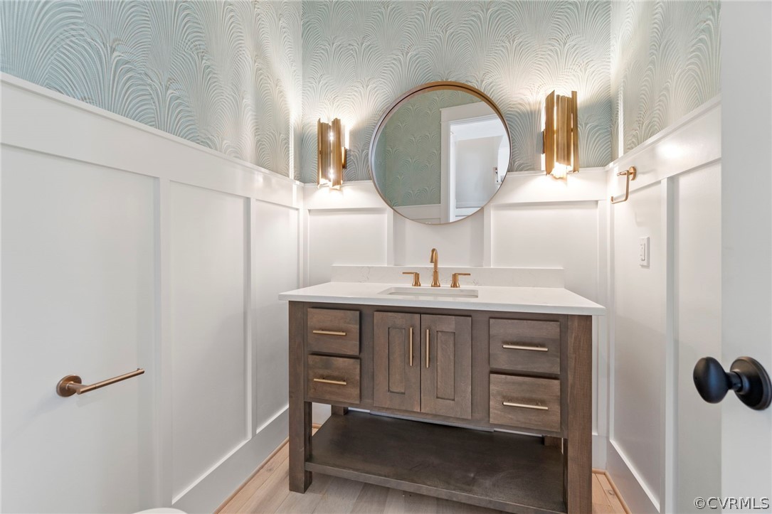 Powder Room. *Photos of Previous Model Home. Optional Features and Finishes may be demonstrated.*