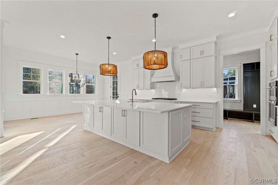 Spacious Kitchen area w/ huge Island.*Photos of Previous Model Home. Optional Features and Finishes may be demonstrated.*