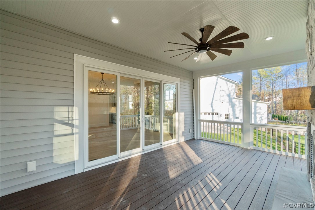 Covered Rear Porch Area. *Photos of Previous Model Home. Optional Features and Finishes may be demonstrated.*