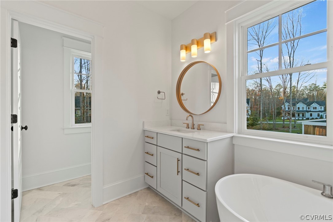Ensuite Master Bathroom. *Photos of Previous Model Home. Optional Features and Finishes may be demonstrated.*