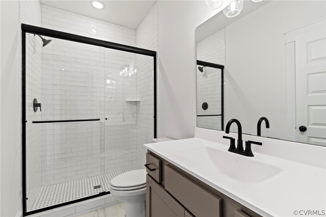 Secondary Ensuite Bathroom - 2nd Floor. *Photos of Previous Model Home. Optional Features and Finishes may be demonstrated.*