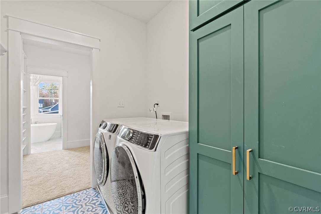 Laundry Room - 2nd Floor. *Photos of Previous Model Home. Optional Features and Finishes may be demonstrated.*