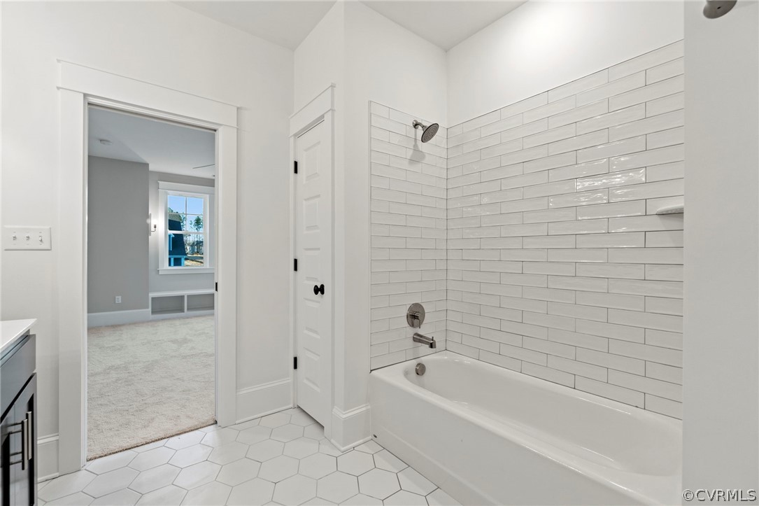 Secondary Bathroom on 2nd Floor. *Photos of Previous Model Home. Optional Features and Finishes may be demonstrated.*