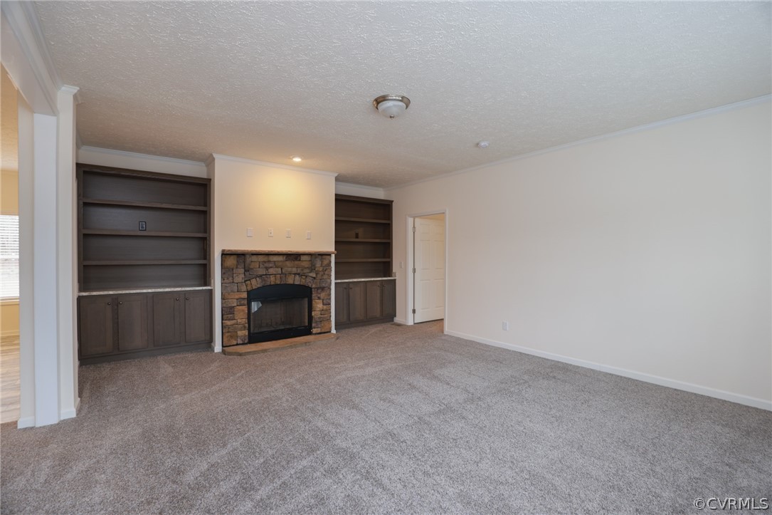 Large Room with Fireplace and Built-In Shelves