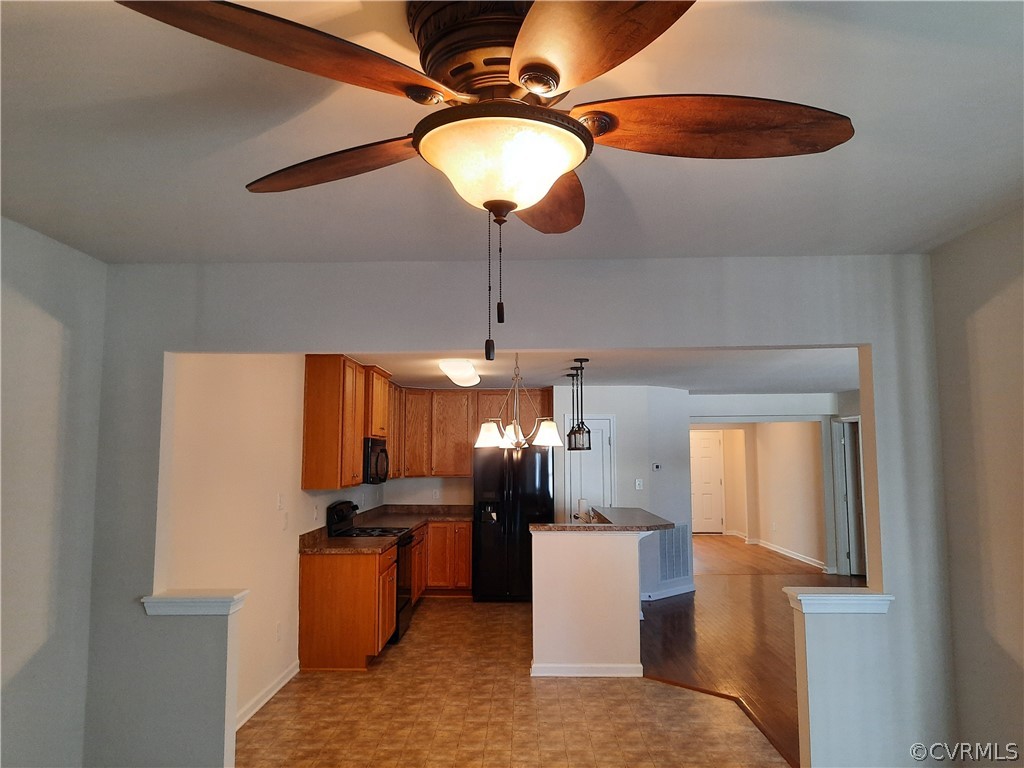 View from Breakfast/Dining/Morning Rm to the Kitchen. Ceiling Fan with Light.