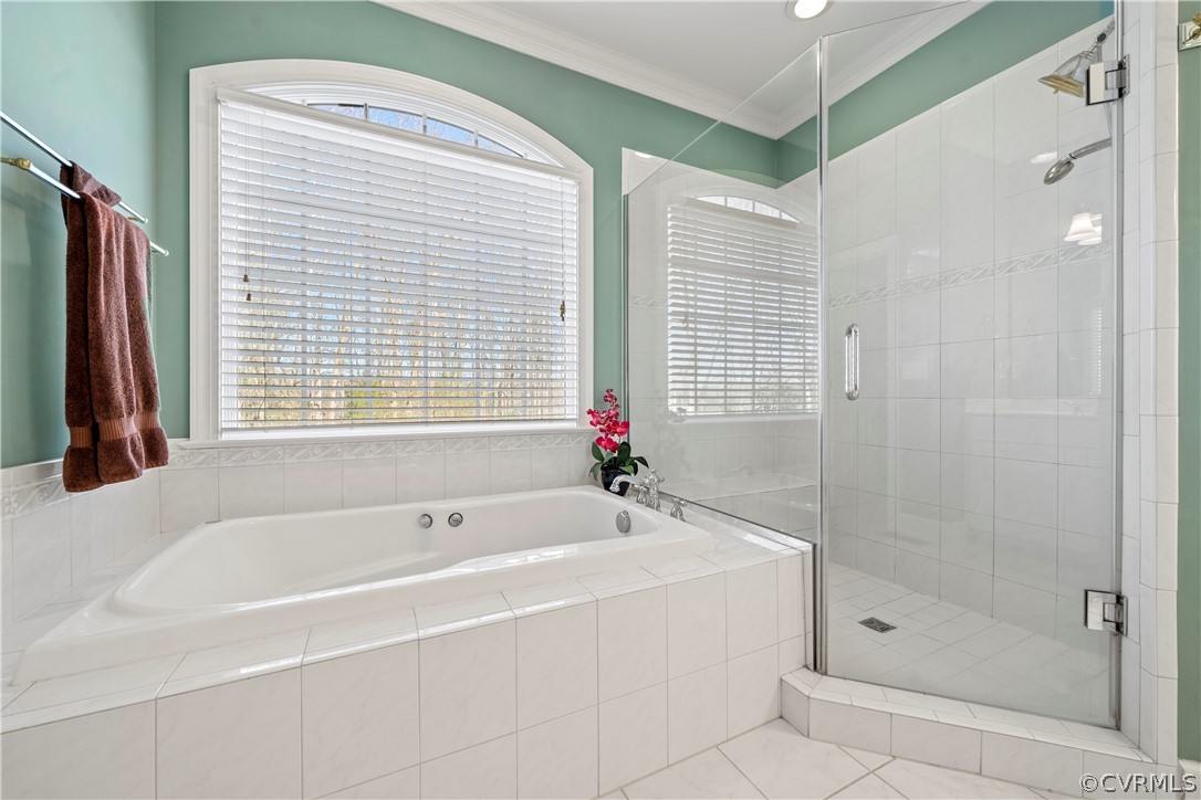 Primary bath with jetted tub and walk-in shower