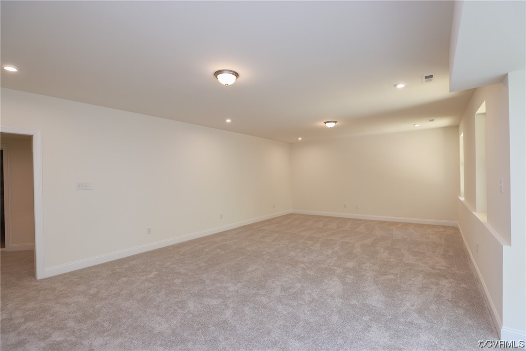 Finished walk-out basement w/ bedroom, full bath, and gathering space.