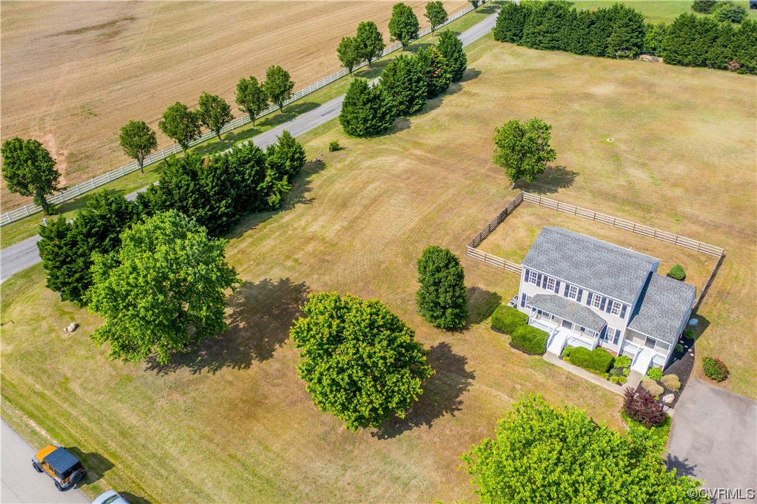 This gorgeous colonial style home is located in Powhatan and sits on a private 2.8550 acre lot.