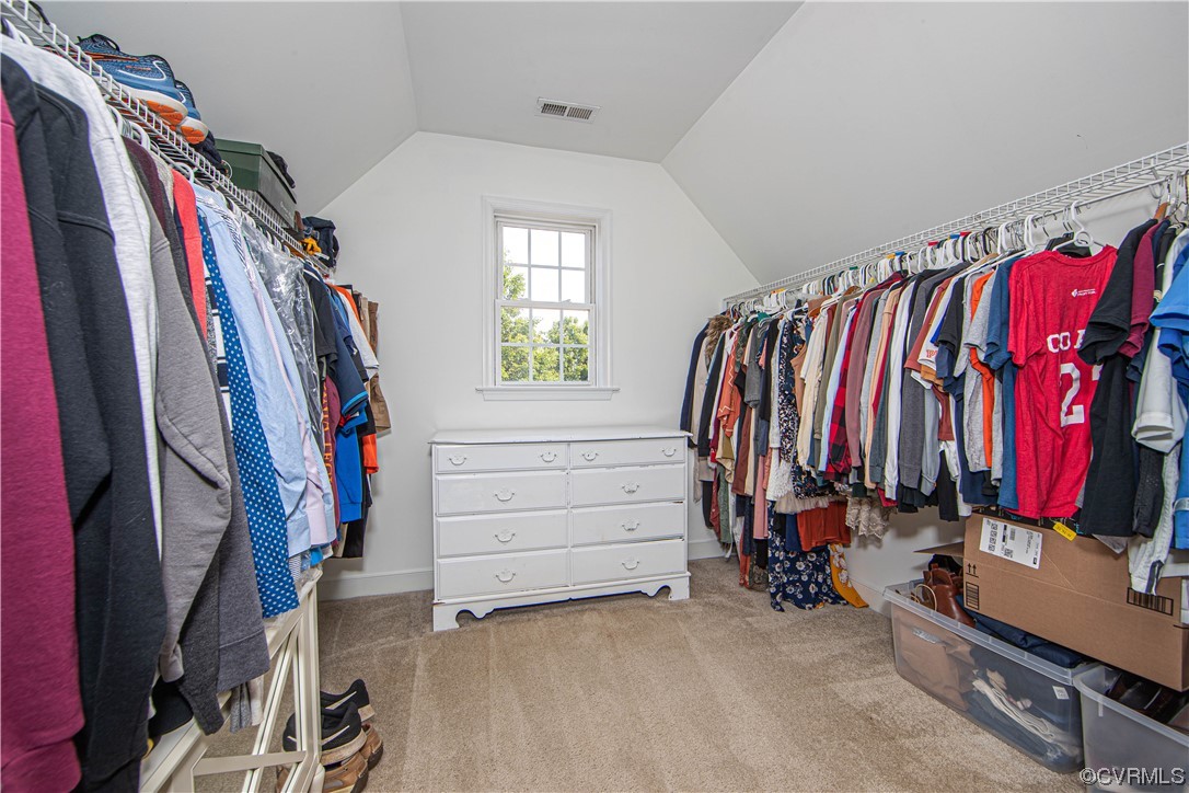  A view of the spacious walk in closet.