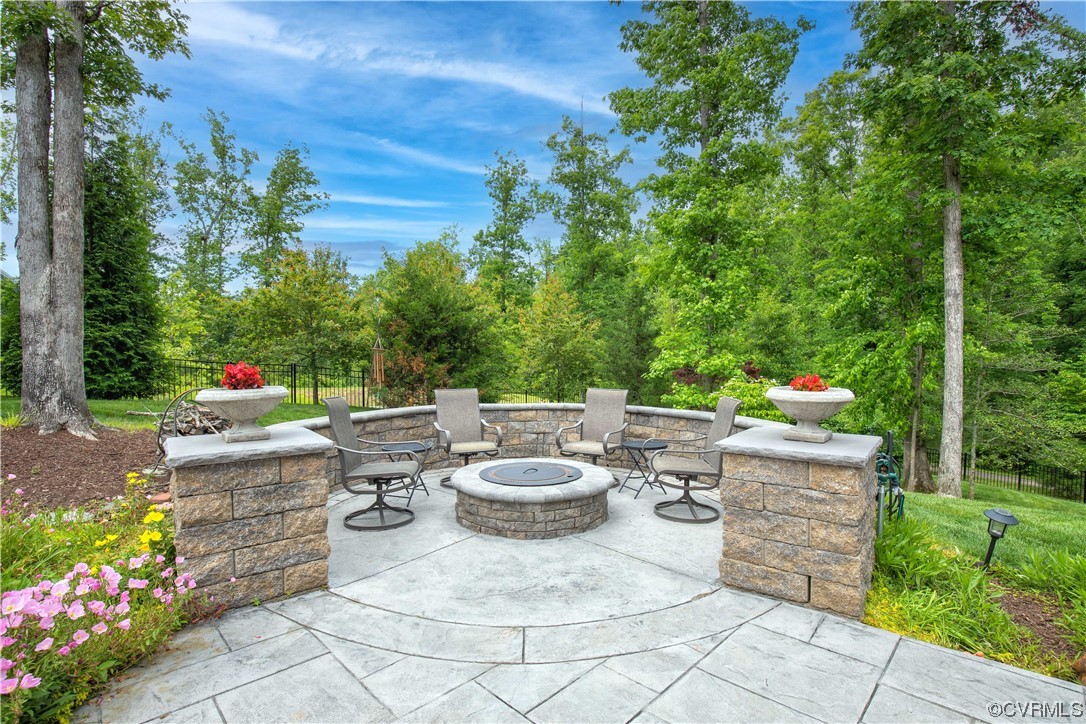 Fire pit with stone-enclosed patio