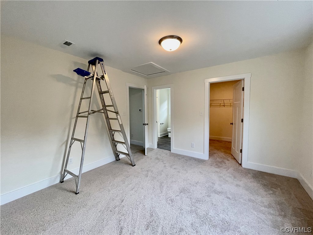 Upstairs Bedroom with carpet