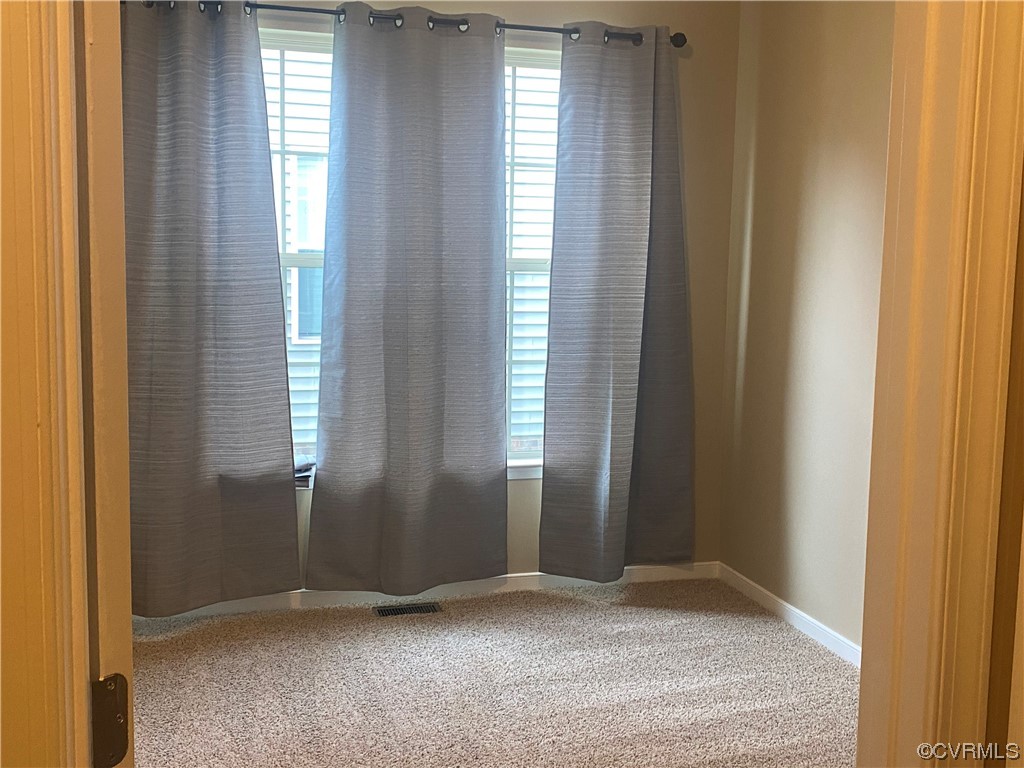 Downstairs bedroom (Add Armoire/Wardrobe) or use as flex room