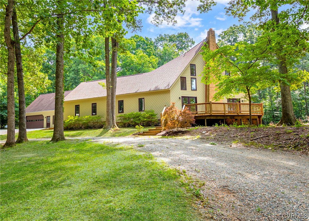 A MUST SEE TO APPRECIATE- THIS CUSTOM HOME HAS IT ALL AND SO MUCH MORE- (some photos have the grass shown a greener tone) 13.50 ACRES OF PURE PARADISE