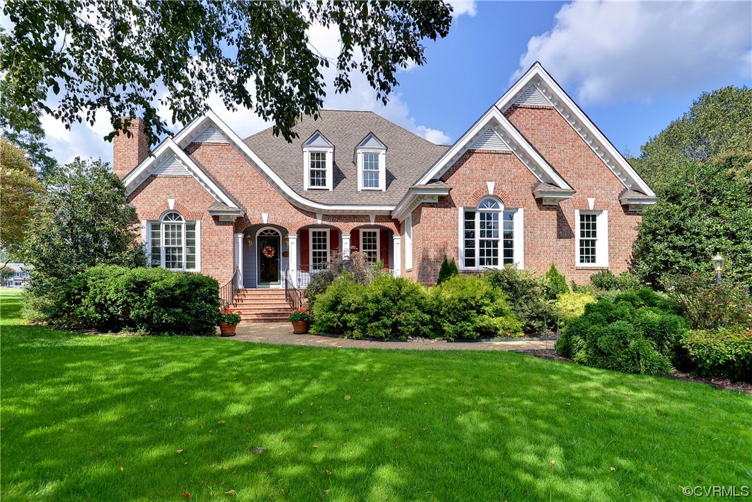 Located at the end of a cul-de-sac, this custom-built all-brick home offers the BEST in golf-front living with a fabulous open floor plan.