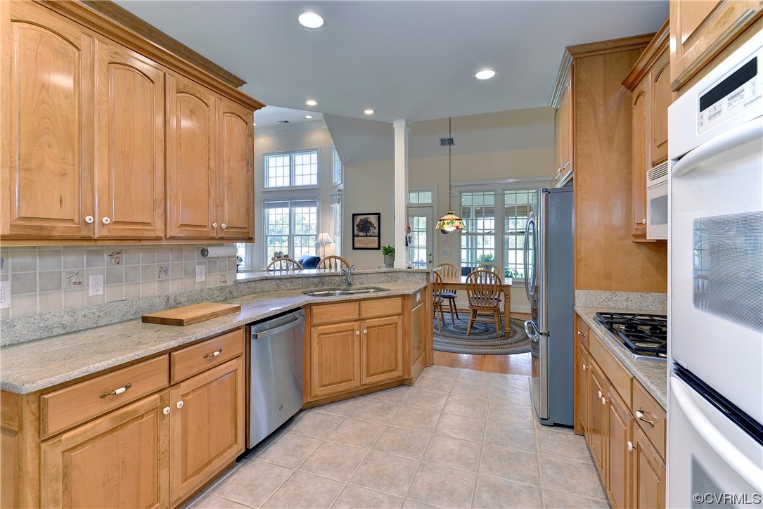 The kitchen is open to the breakfast room and great room.