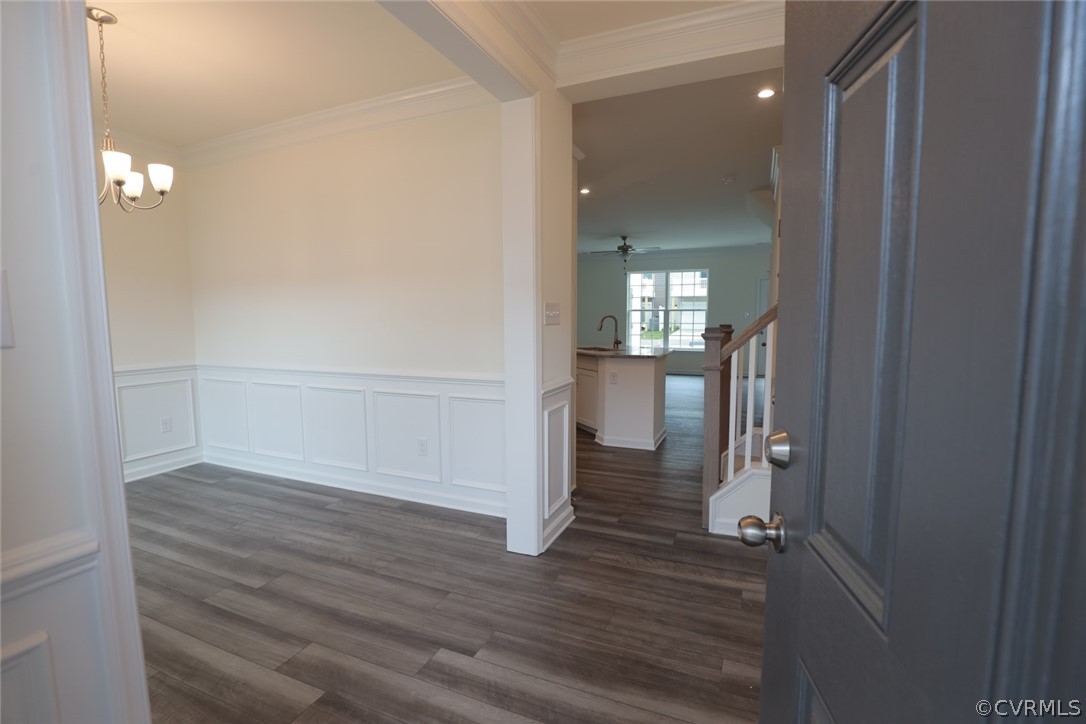 Photo represents the plan, not the actual home. Design selections may vary. Stepping inside you'll be greeted by the formal dining room. Spacious family room open to kitchen.