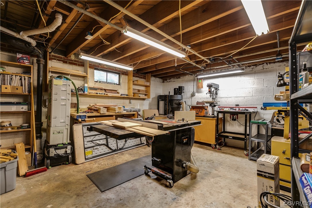Basement with a workshop or storage area
