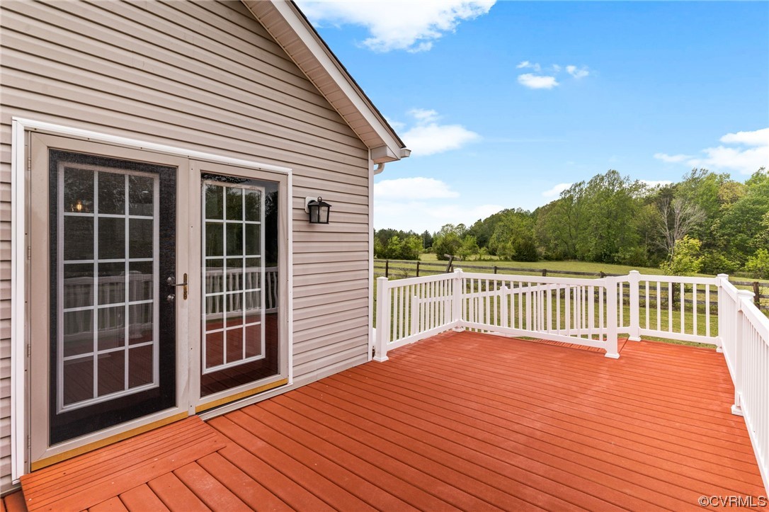 Walk out from the Kitchen to large deck w/ entry ramp
