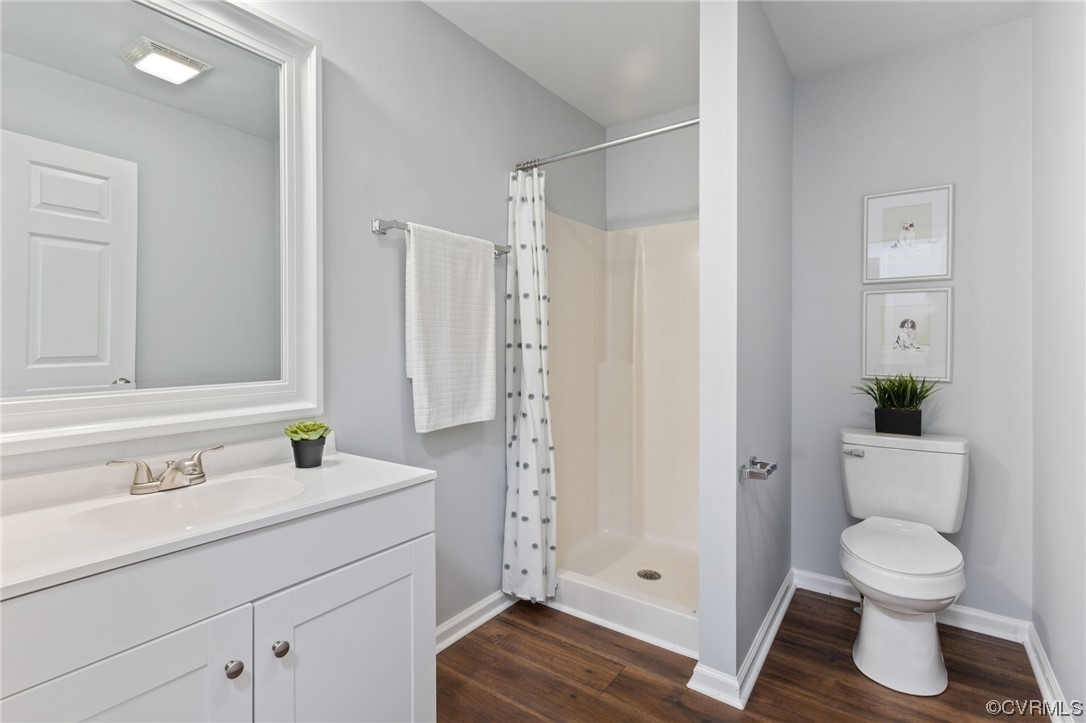 Additional full bath with walk-in shower and single
vanity