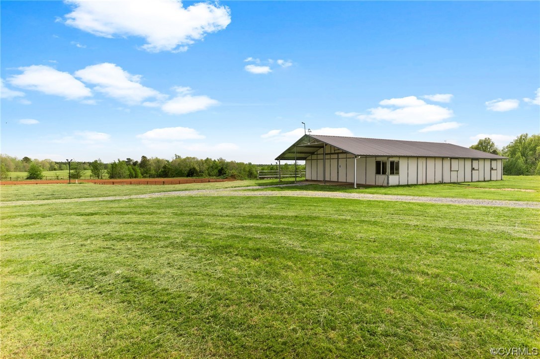 wide view of the 8 stall barn and lighted arena