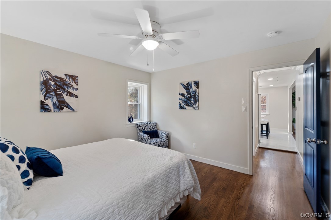 Bedroom featuring dark hardwood / wood-style floors and ceiling​​‌​​​​‌​​‌‌​‌‌​​​‌‌​‌​‌​‌​​​‌​​ fan