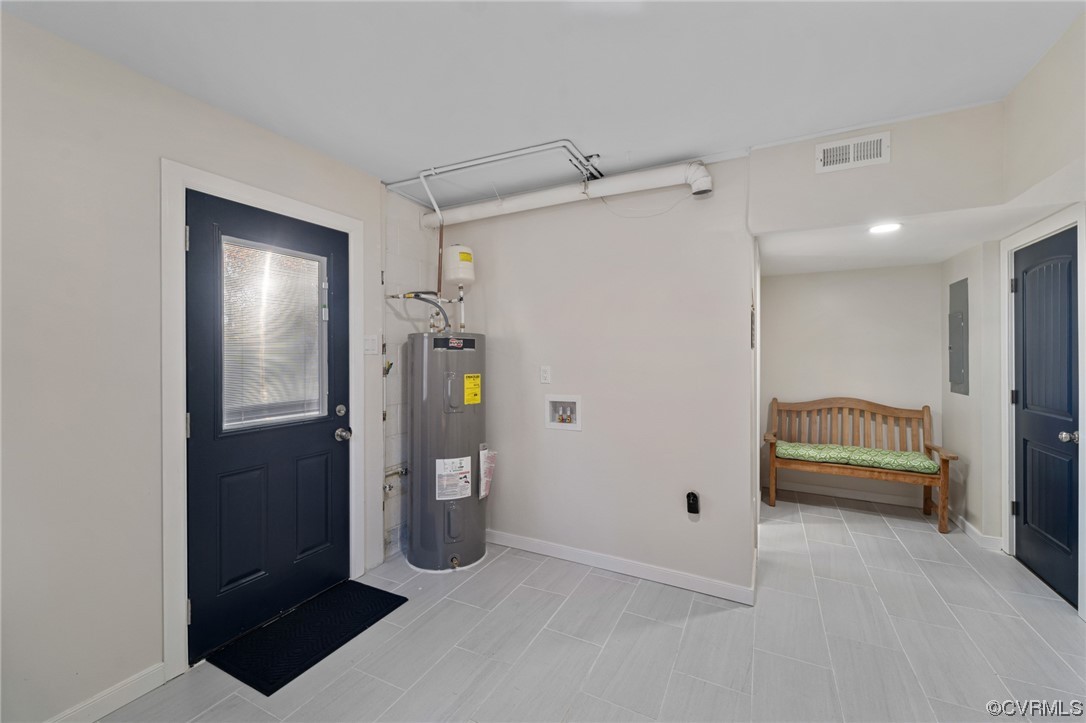 Tiled foyer with electric water heater