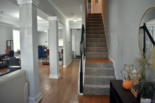 Stairway In Foyer leads to Main Living Area & Second Level