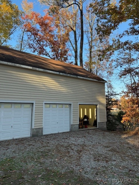View of home's exterior featuring a garage