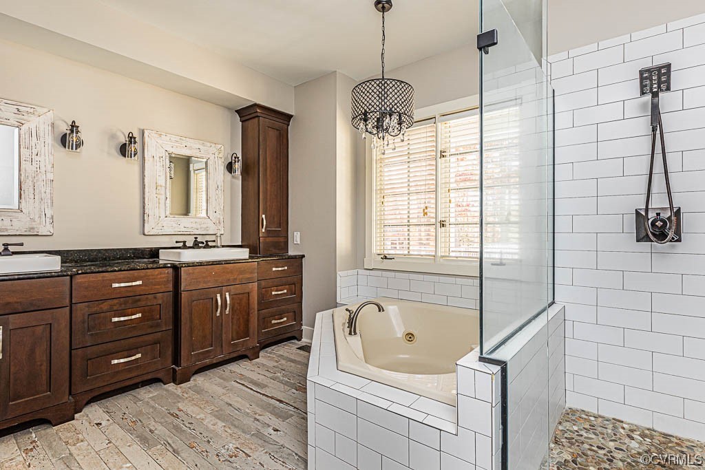 Wonderful Tile Shower & Jetted Tub! Notice the special Tile Plank Floor!