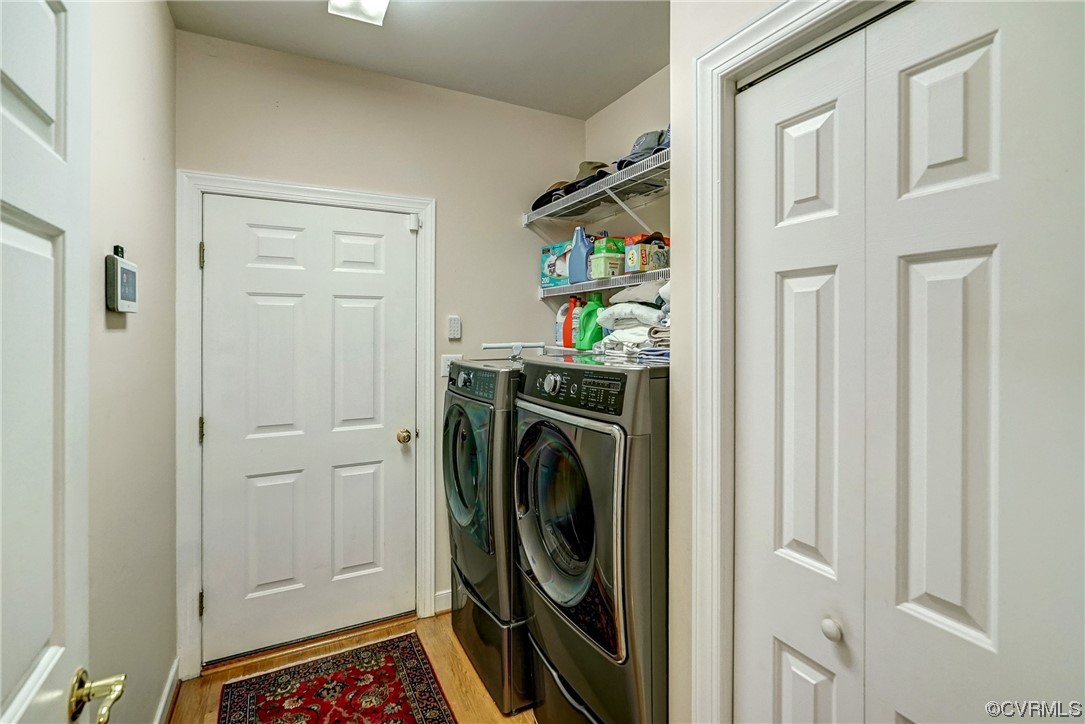 Washer/dryer hookup, pantry, entry into 2 car garage. hardwood flooring