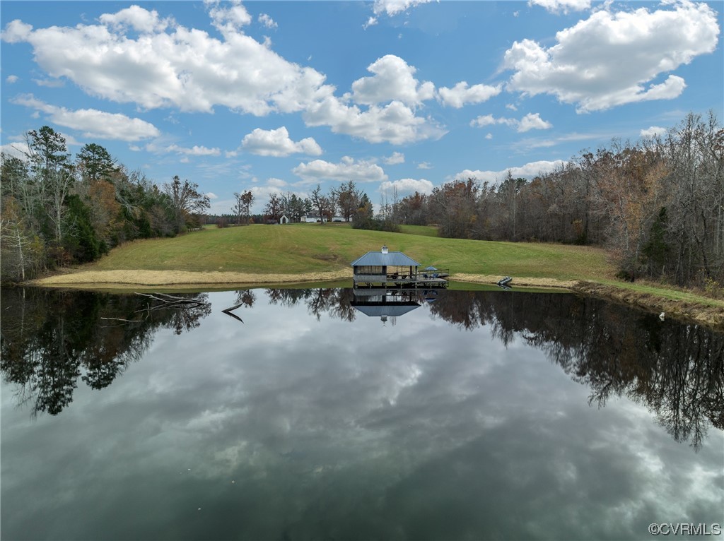 Large multi-acre stocked Pond with view back to House