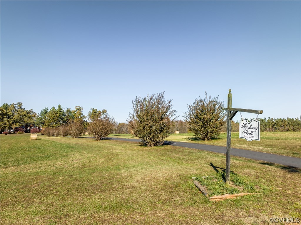 Hickory Hill sign at approach to property