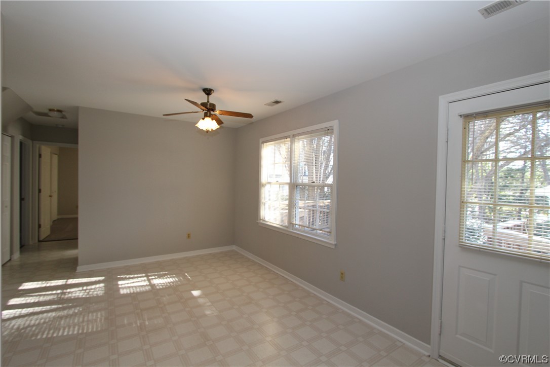 Eat-in Area of Kitchen. 
 Laundry closet in hallway with newer washer.  Dryer included as well.